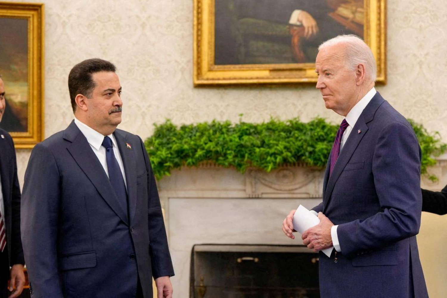 الرئيس الأميركي جو بايدن يلتقي رئيس الوزراء العراقي محمد شياع السوداني في البيت الأبيض (رويترز)